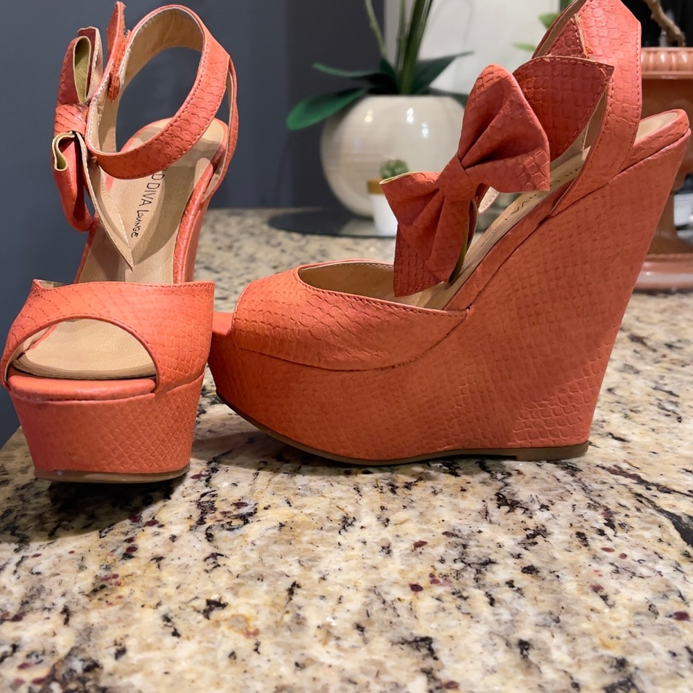 coral snake orange wedge sandalsSize 5 show little wear , hook and loop closure